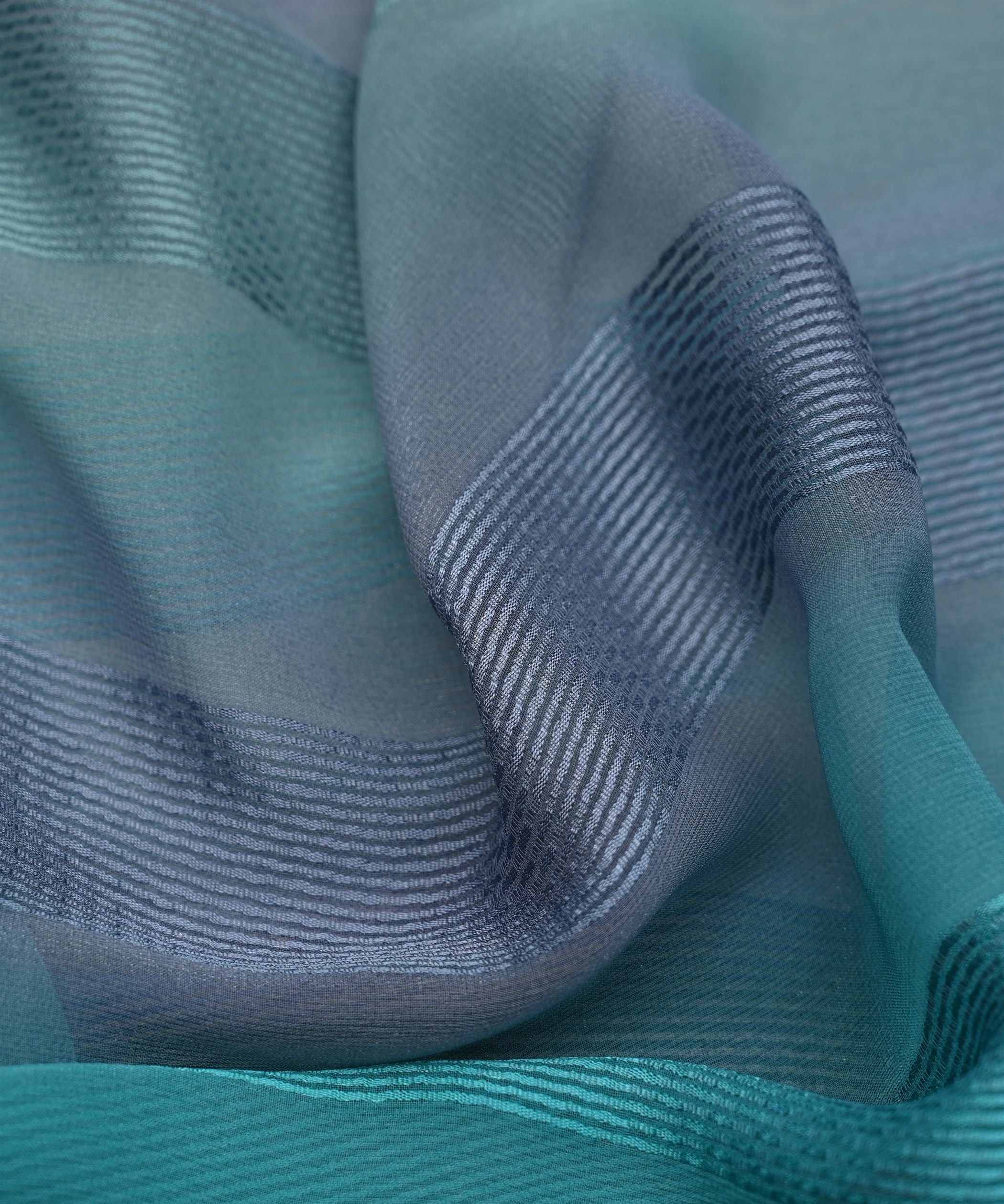 Aquamarine Shaded Georgette Fabric with Zari Patta