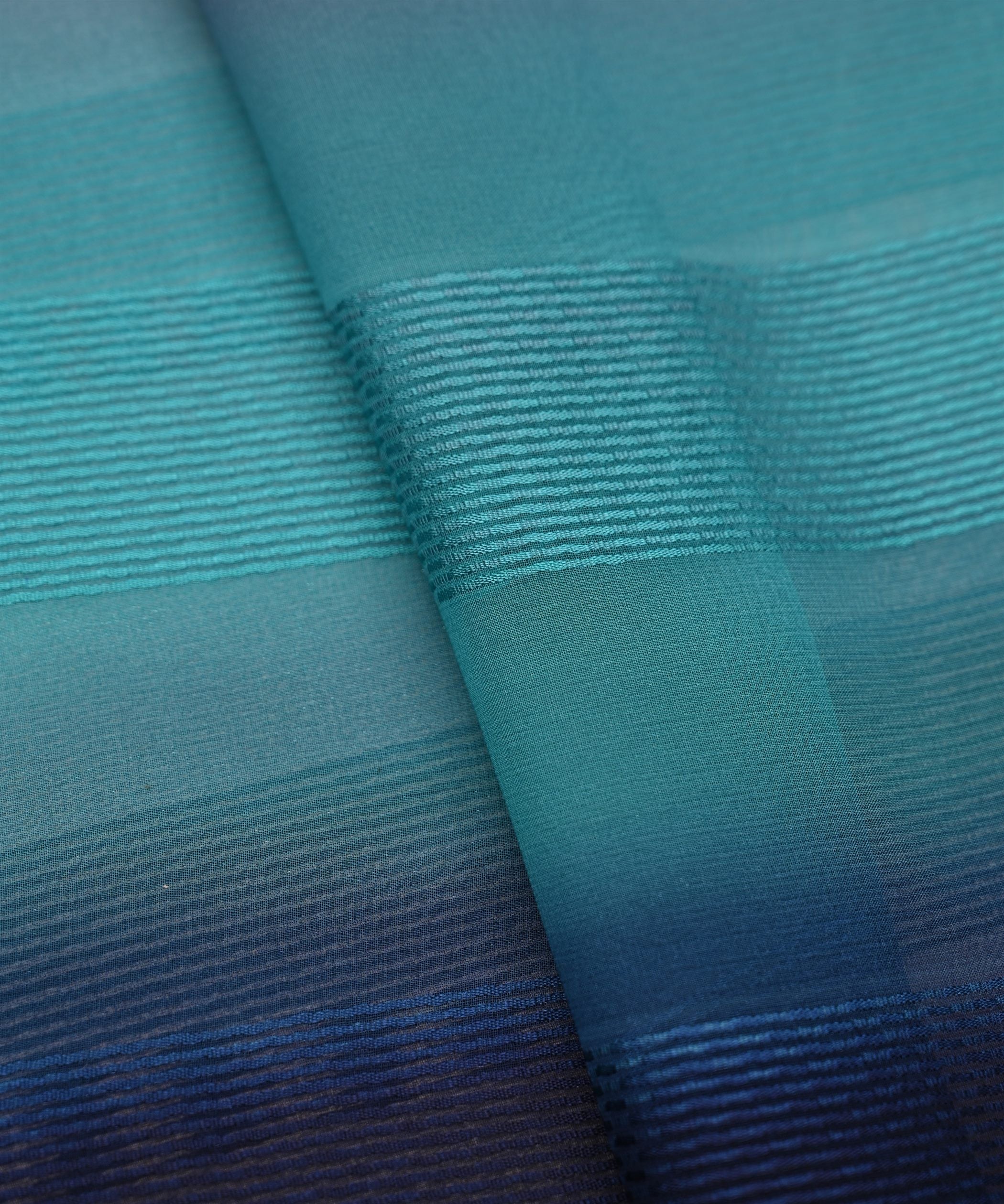 Aquamarine Shaded Georgette Fabric with Zari Patta